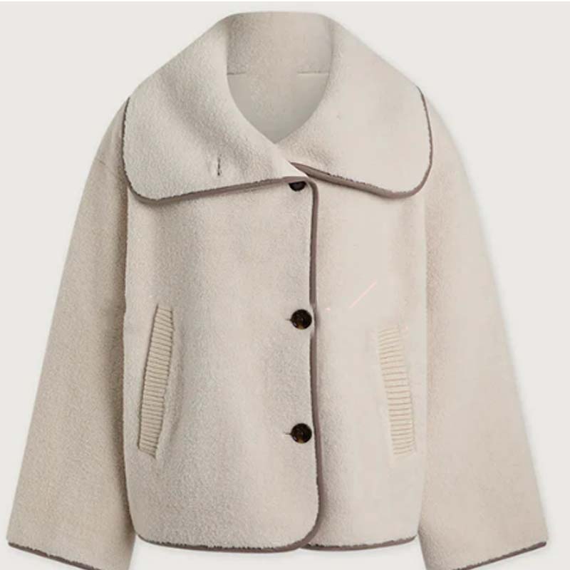 Veste à revers texturée et boutons pour femme