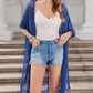 🌸🦋🌼 OFFRE LIMITÉE 50% DE RÉDUCTION! Poncho/Pareo Bohème en Maille Ajourée pour Femme – Ouverture Devant avec Pompons et Franges, Tissu Léger, Idéal pour les Jours Ensoleillés, les Vacances et le Quotidien Chic ✨🎶