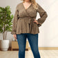 Blouse enveloppante à manches longues avec col en V et volants