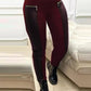 PANTALON EN SIMILI-CUIR AVEC BORDURE ET FERMETURE ÉCLAIR CONTRASTANTES