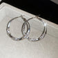 Boucles d'oreilles circulaires avec zircon