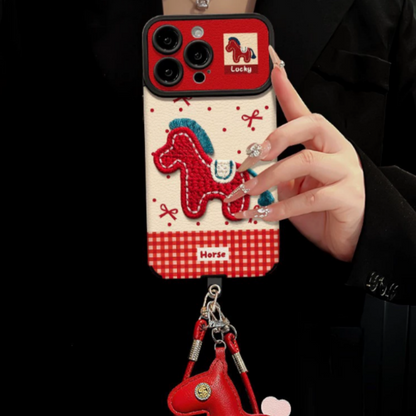 Étui pour téléphone brodé avec un joli cheval et une lanière pour poupée
