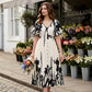 👗 52% de réduction✨Robe midi élégante à col en V et imprimé botanique🍂