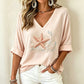 T-shirt imprimé à col en V pour femme