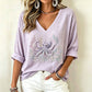 T-shirt imprimé à col en V pour femme